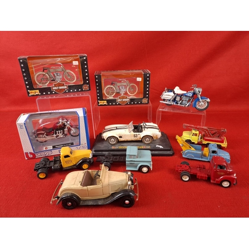 311 - Collection of die cast model cars and motorbikes. Makers include Budgie, ERTL, Burago