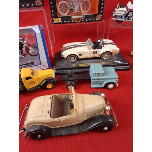 311 - Collection of die cast model cars and motorbikes. Makers include Budgie, ERTL, Burago