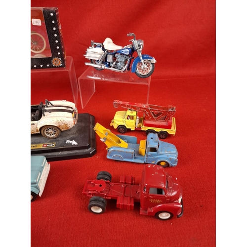 311 - Collection of die cast model cars and motorbikes. Makers include Budgie, ERTL, Burago