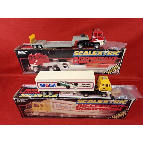 319 - 2 x vintage Scalextric Juggernauts one Road train and one Lowrider. Boxed in excellent condition