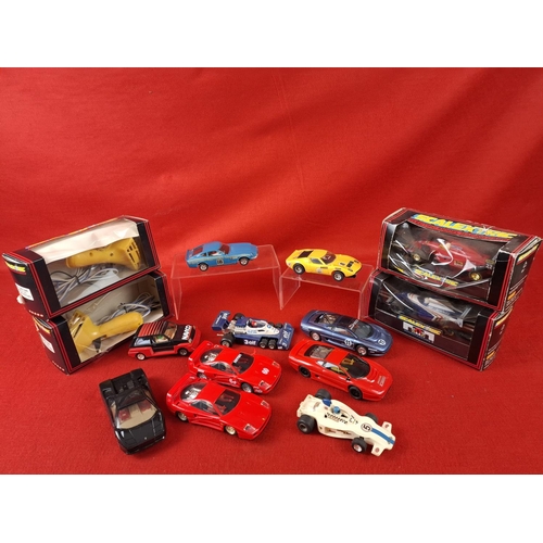 320 - Collection of vintage Scalextric cars & two controls