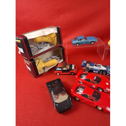 320 - Collection of vintage Scalextric cars & two controls