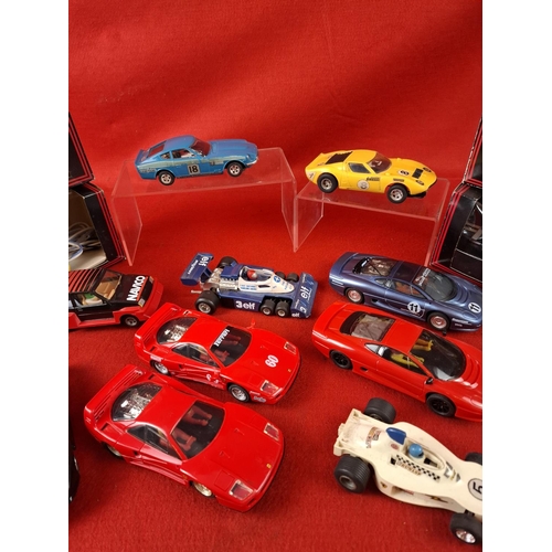 320 - Collection of vintage Scalextric cars & two controls