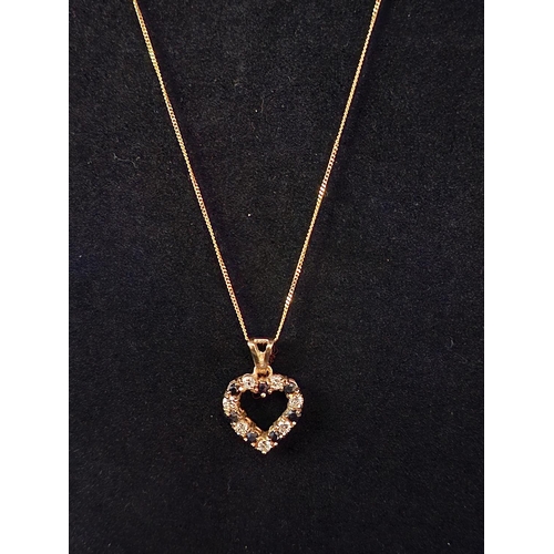 33 - 9ct gold necklace with 9ct gold heart pendant 2.4 grams