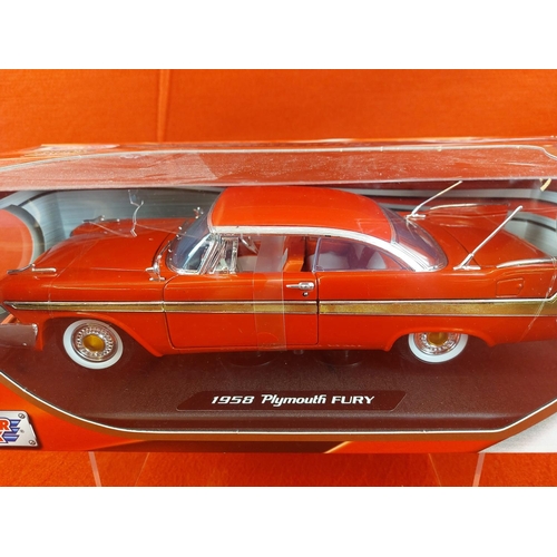 331 - Motor Max 1:18 1958 Plymouth Fury in box. Box damaged as pictured