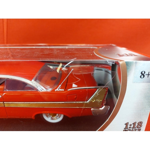 331 - Motor Max 1:18 1958 Plymouth Fury in box. Box damaged as pictured