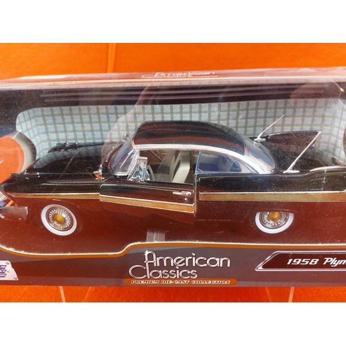 334 - Motor Max 1:18 1958 Plymouth Fury in box.