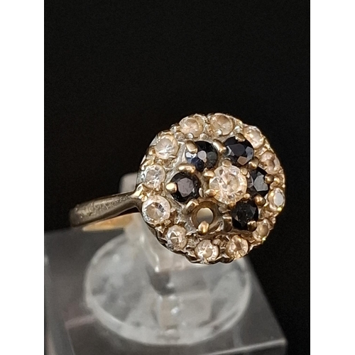 35 - 2 x 9ct gold rings. Cluster ring missing a stone and heart ring band bent. 4.4 grams