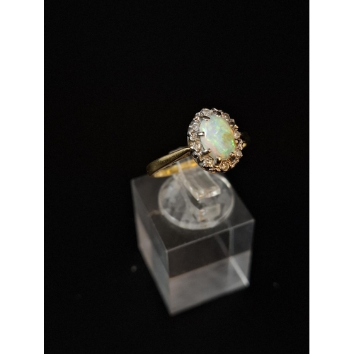 37 - Very attractive 18ct gold white opal cluster ring with 8 diamond surround size P including 2 9ct gol... 