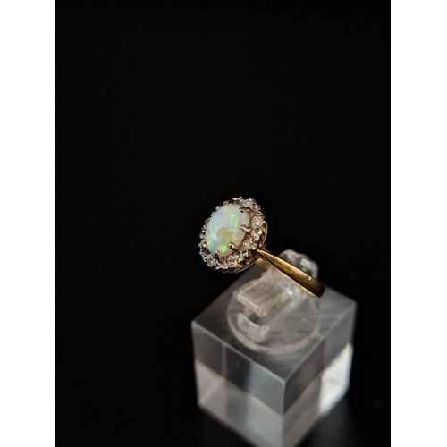 37 - Very attractive 18ct gold white opal cluster ring with 8 diamond surround size P including 2 9ct gol... 