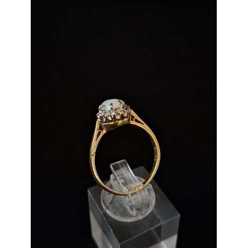 37 - Very attractive 18ct gold white opal cluster ring with 8 diamond surround size P including 2 9ct gol... 