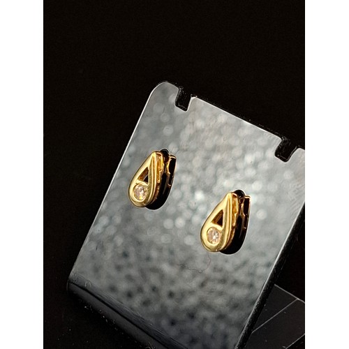 57 - 18ct gold & diamond earrings 2 grams