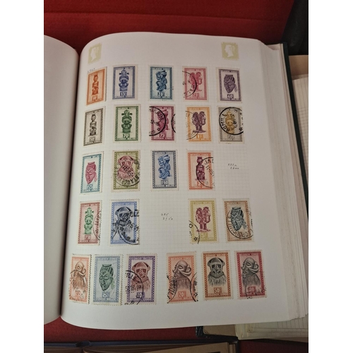 113 - 6 Stamp albums with large collection of various world stamps. One album blank