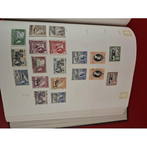 114 - 3 Stamp albums with large collection of various world stamps.