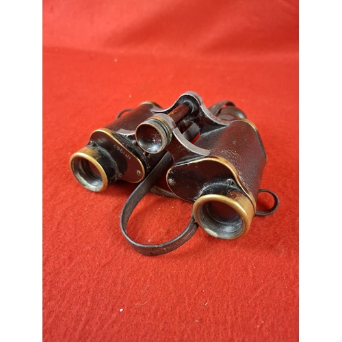 130 - Pair of pre WW1 military binoculars Swiss dated 1912.