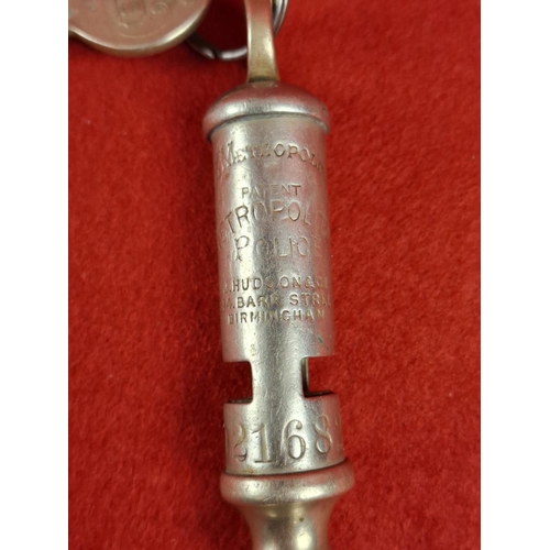 132 - Genuine vintage Metropolitan Police whistle with key. Serial number 021682 stamp and makers mark.