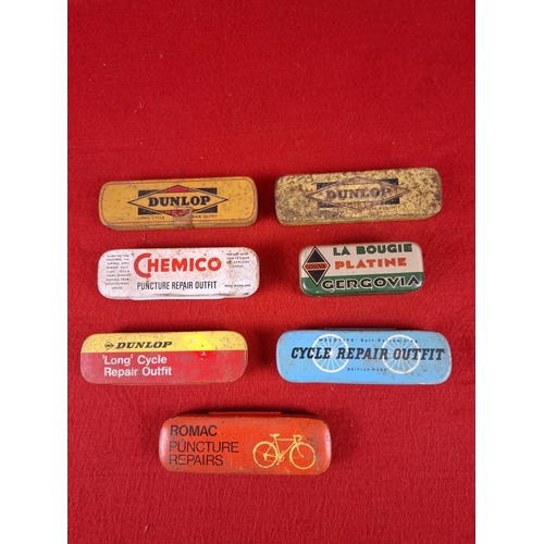 200 - 7 Bicycle vintage repair tins.