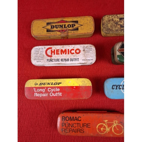 200 - 7 Bicycle vintage repair tins.