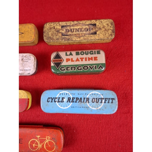 200 - 7 Bicycle vintage repair tins.