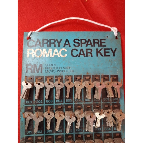 212 - Romac tin car key display unit with keys. Height 75cm Width 28cm