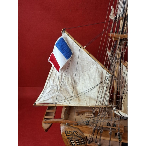 270 - Large wooden model of French frigate no base. Height 35