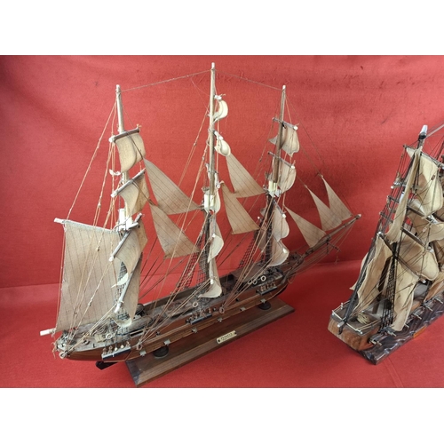 271 - 2 wooden model frigates. Taller model to left Height 24