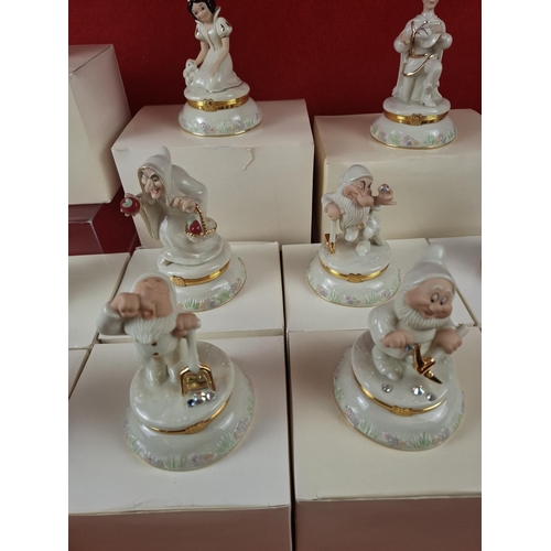 275 - Superb collection of Lenox Disney Snow White porcelain treasure boxes including charms. Highly colle... 