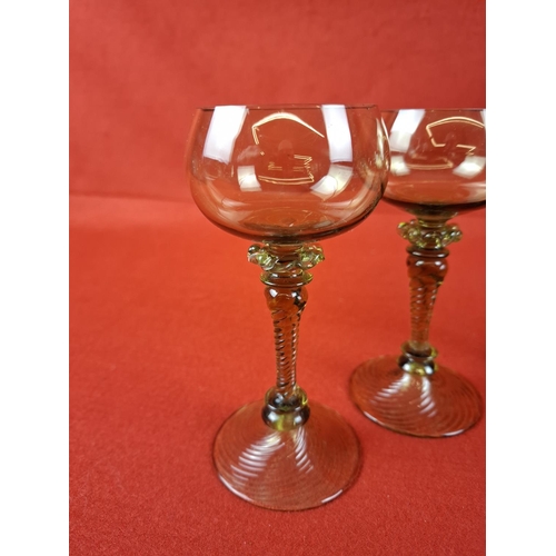 294 - Collection of 6 antique German Green wine glasses with twisted stems and wrythen feet.