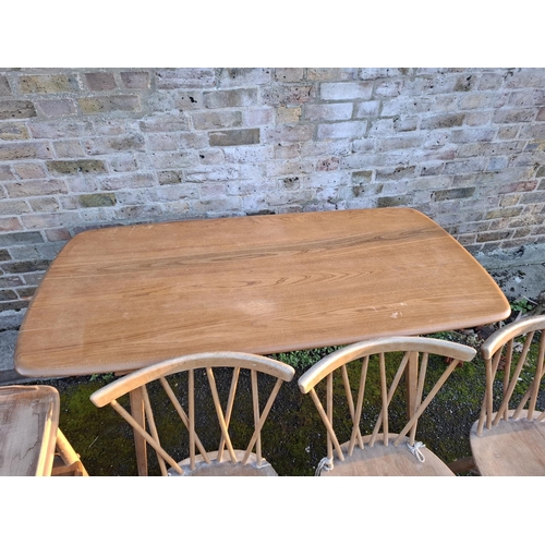 295 - Ercol light wood furniture including dining table, drinks trolley & 3 candlestick chairs