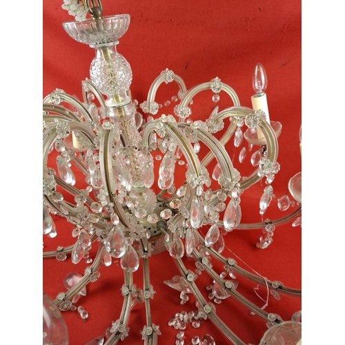 296 - Vintage crystal chandelier in need of attention Height 59cm approx Width 95cm approx.