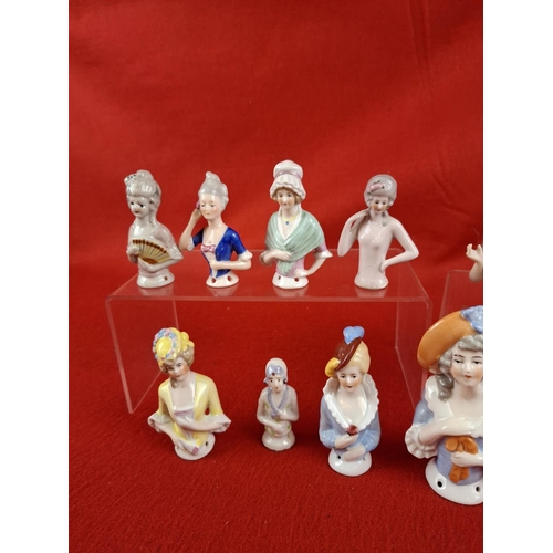 306 - Nice collection of china pin chusion dolls including Bisque German doll marked 3615