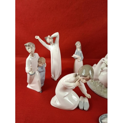 307 - Collection of 10 Lladro figurines.