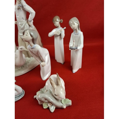 307 - Collection of 10 Lladro figurines.