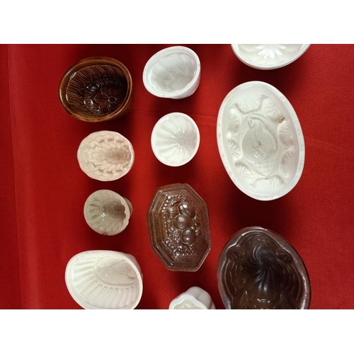 308 - Collection of vintage pottery and china jelly moulds.