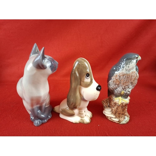 319 - 3 x china animals Cat by Royal Copenhagen, Falcon by Royal Doulton & Dog by Szeiler