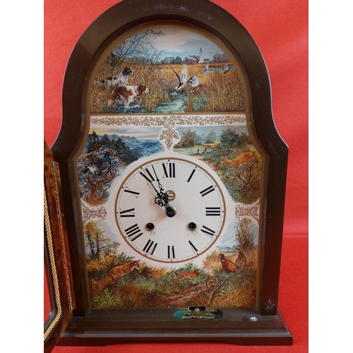 352 - Mantle clock with countryside scenes to the face.