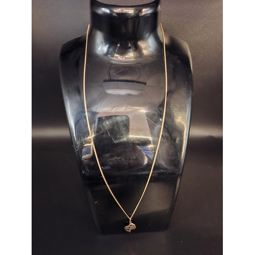 39 - 9ct gold necklace with Pisces pendant 2 grams