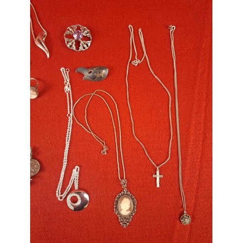 57 - Collection of silver hallmarked jewellery including charm bracelet, necklaces and pins total weight ... 