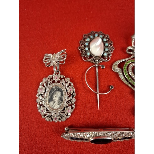 62 - Collection of pendants, brooch (silver hallmarked), locket 9ct back & front & gold & silver ring