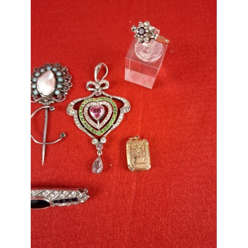 62 - Collection of pendants, brooch (silver hallmarked), locket 9ct back & front & gold & silver ring