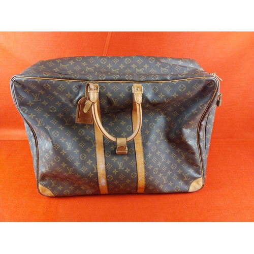 204 - Authentic Louis Vuitton Sirius 65 Monogram soft sided suitcase/travel bag. Serial number SP0932. Con... 