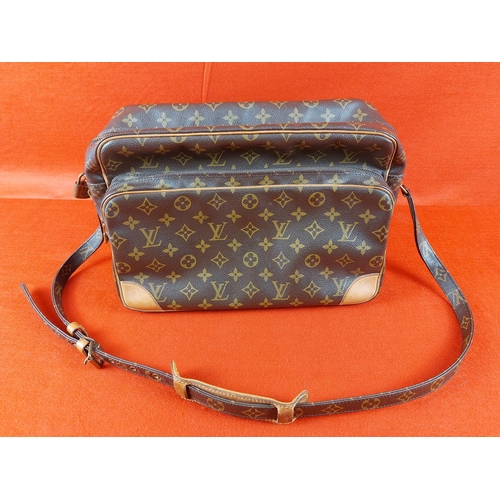 205 - Authentic Louis Vuitton Monogram Nile shoulder bag. Serial number TH 8905. Size approximately width ... 