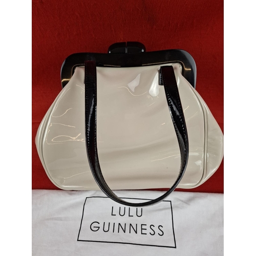 208 - Lulu Guinness designer cream and black patent handbag unused with storage bag.