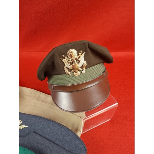 258 - Collection of various military berets and hats.