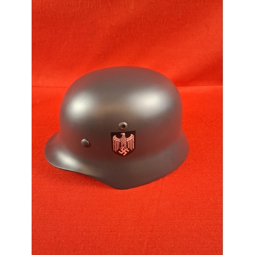 260 - Reproduction WW2 German helmet well made with leather lining looks unused.