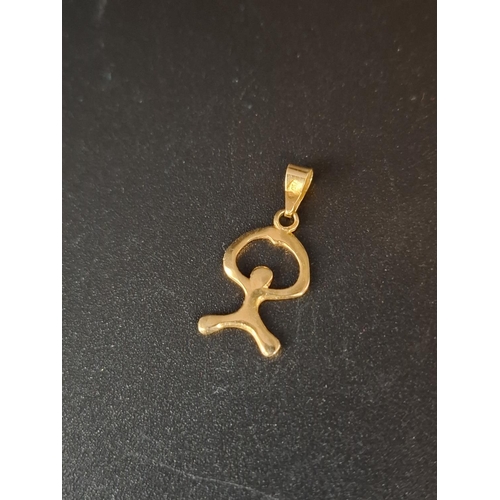 29 - 18ct gold pendant 0.6 grams