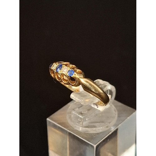 36 - 18ct gold Diamond and Sapphire ring 2.2 grams size M