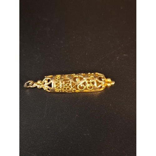 58 - 9ct gold Mezuzah pendant 2.6 grams