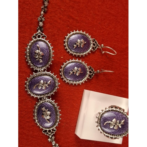 100 - Attractive early 20th century silver hallmarked set including bracelet, earrings and ring with ename... 