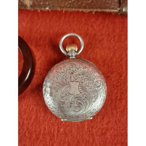 103 - Ladies silver pocket watch with original bakelite case